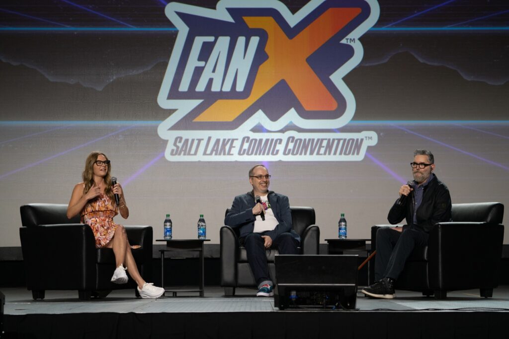 Craig Price moderating the Psych panel with Maggie Lawson and Timothy Omundson at FanX 2022