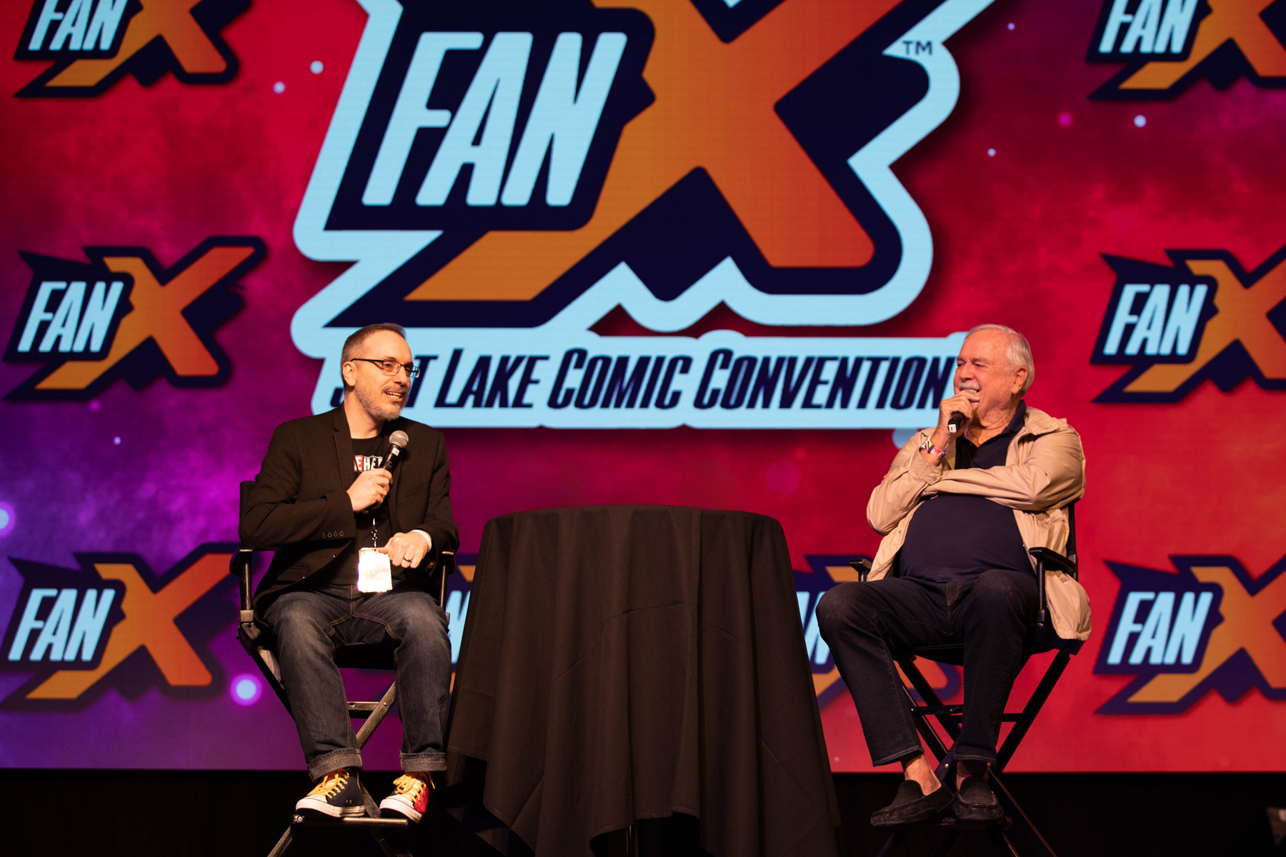 Craig Price moderating a conversation with John Cleese at FanX Salt Lake Comic Convention